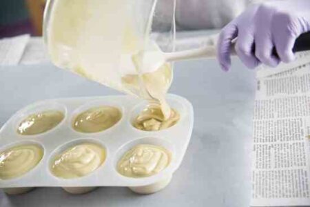 Pouring Oatmeal Soap Into A Mold